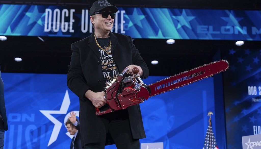 Elon Musk hold a chainsaw as he arrives to speak at the Conservative Political Action Conference, CPAC, at the Gaylord National Resort & Convention Center, Feb. 20, 2025, in Oxon Hill, Md. (AP)